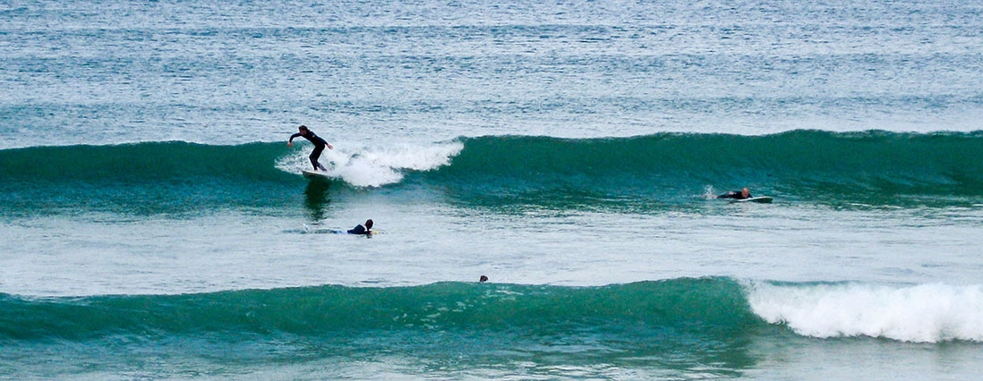 go surfing at Taupo Bay