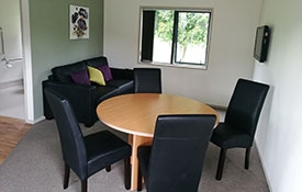 lounge and dining area of 2-bedroom unit